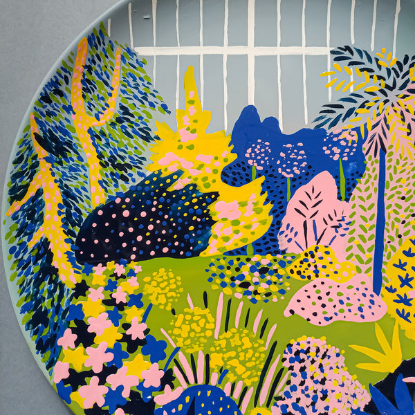 Detail of garden painted on ceramic.